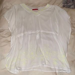 white with yellow design with cover up